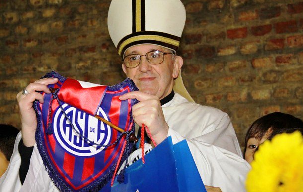 The Pope, shown here with a banner for his team, is a fan of Argentinian football club San Lorenzo