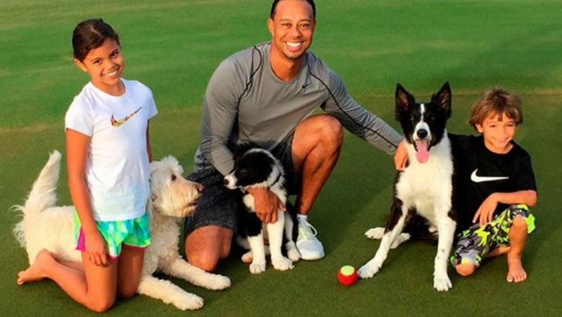 Tiger Woods' kids on the golf course with the family dog and dad