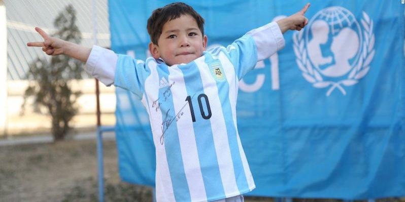 Murtaza Ahmadi in his real Lionel Messi jersey.