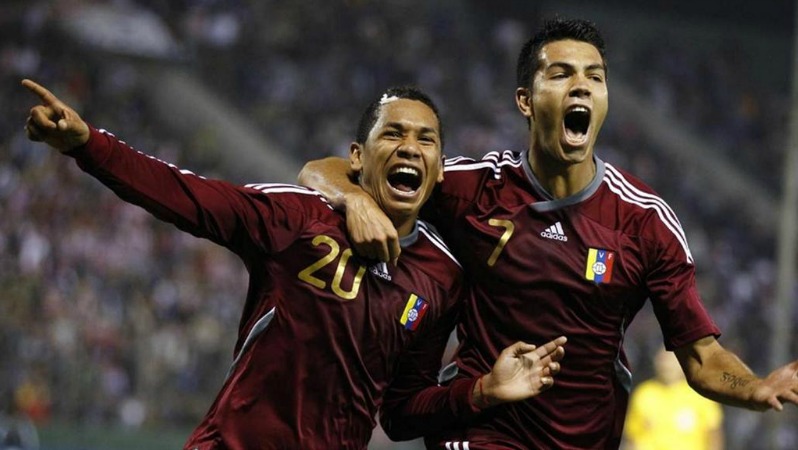 Two Venezuela. players are shown celebrating during Argentina 2011. 