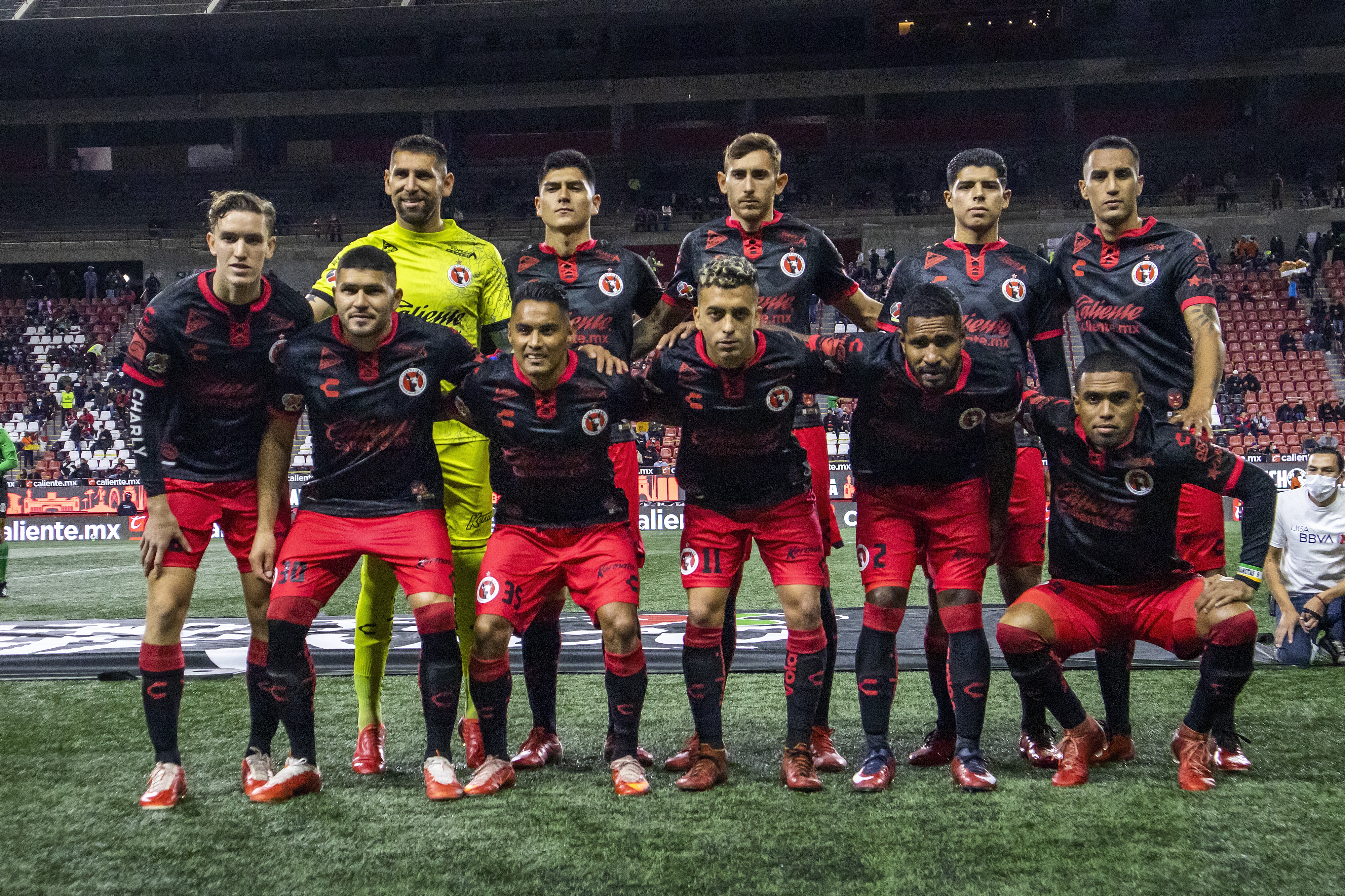 Liga MX: Why Do Xolos Players Wear Red Cleats Only?