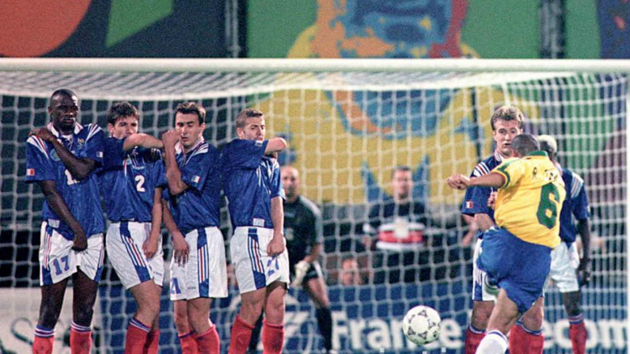 Roberto Carlos curls a FK around the France wall for an improbable goal. 
