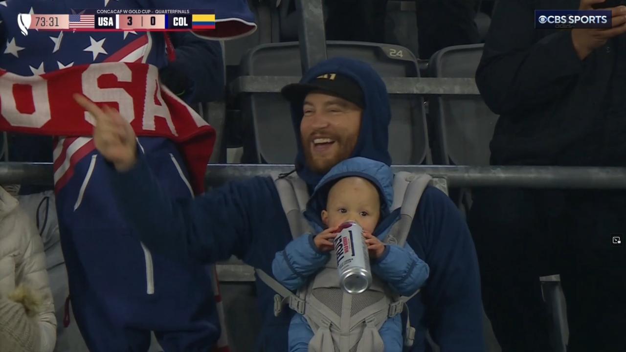 Viral baby holding Truly can in USWNT match against Colombia