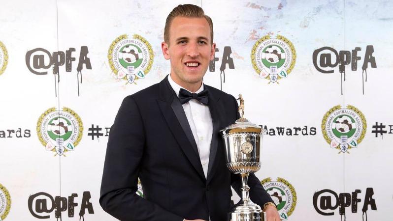 Harry Kane posing with the PFA Young Player of the Year Award