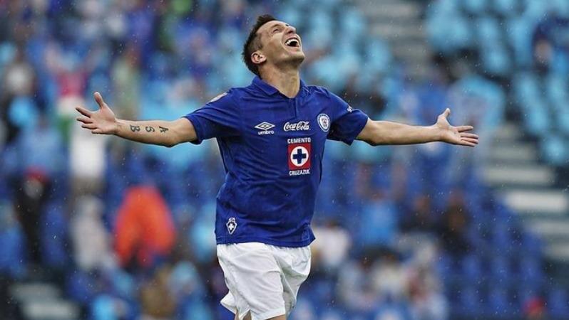 Christian Gimenez celebrates his 100th Liga MX goal