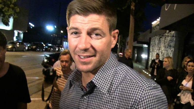 Gerrard smiling in what looks like a TMZ photo.