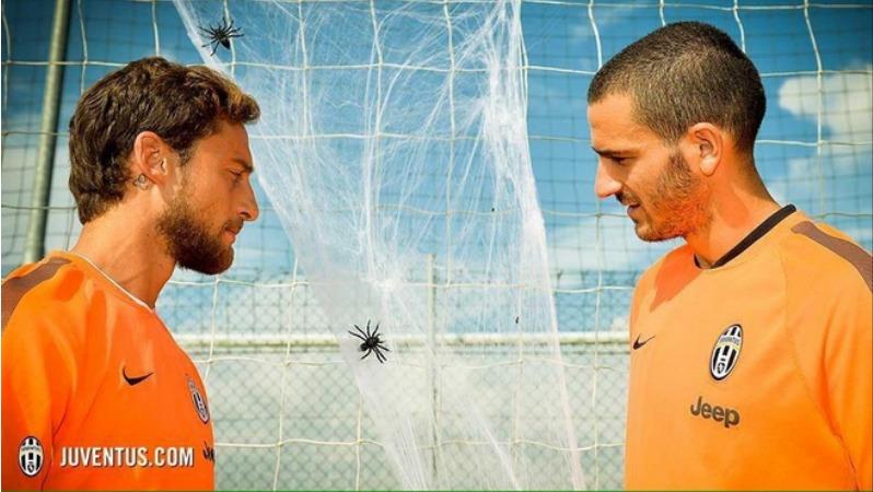 Leonardo Bonucci and Claudio Marchisio with spiders in net