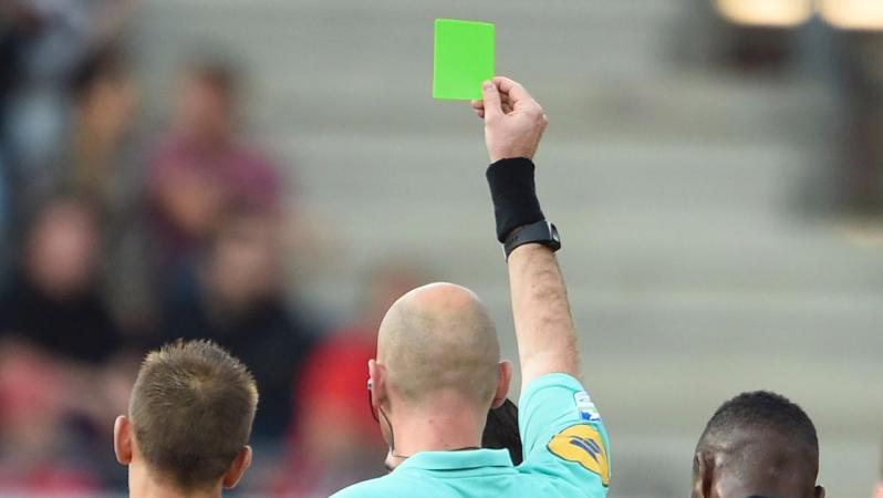 The first green card in soccer.