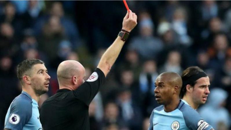 Fernandinho is given a straight red.