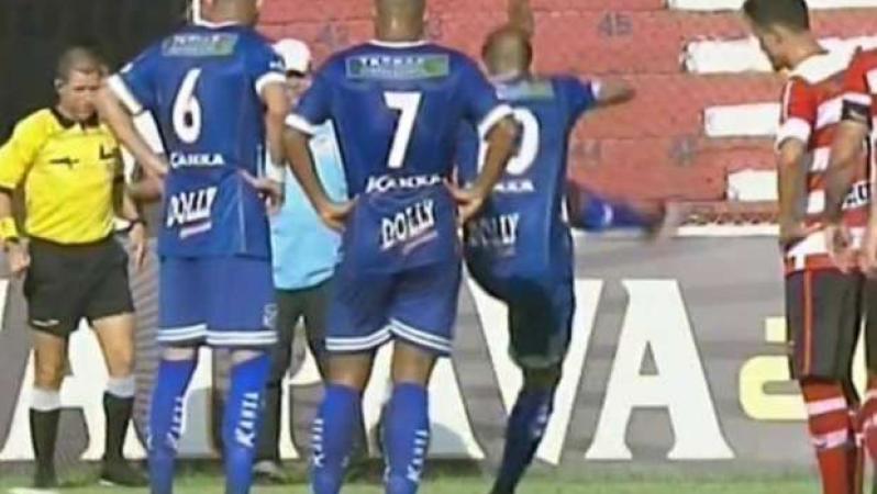 Player kicks a snake in Brazil.
