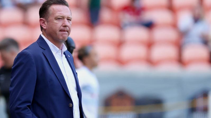 What Did Houston Dash Coach Do