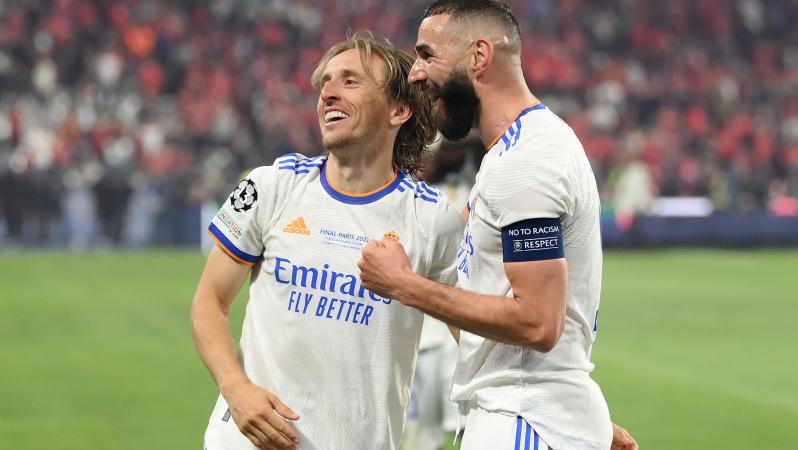 Karim Benzema and Luka Modric celebrate winning the 2021-22 Champions League Final. Both have been Real Madrid Uefa Player of The Year