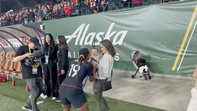Crystal Dunn and baby Marcel