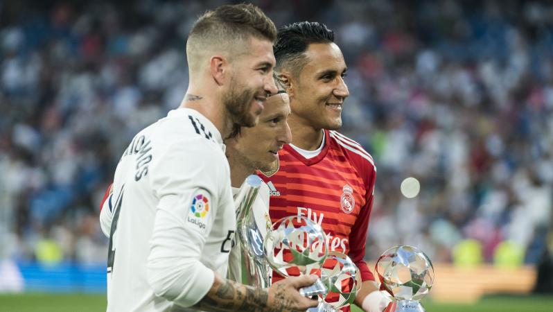 Sergio Ramos, Luka Modric and Keylor Navas of Real Madrid pose with their 2017/18 UEFA Men's Defender, Player of the Year and Goalkeeper of the year awards respectively