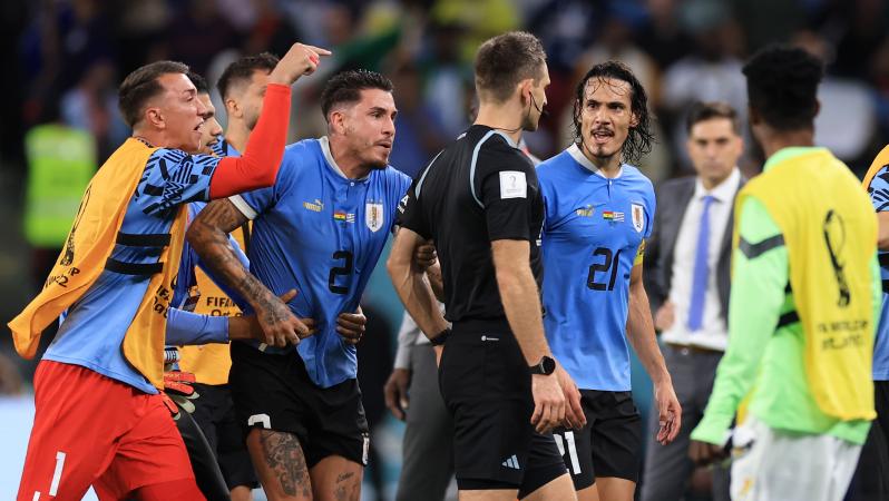 Uruguayan players chase down referee after World Cup exit.