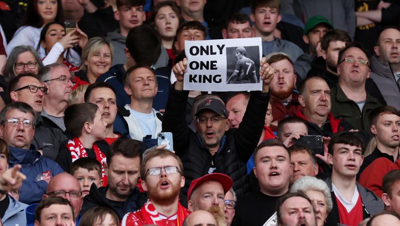 Liverpool fans boo national anthem