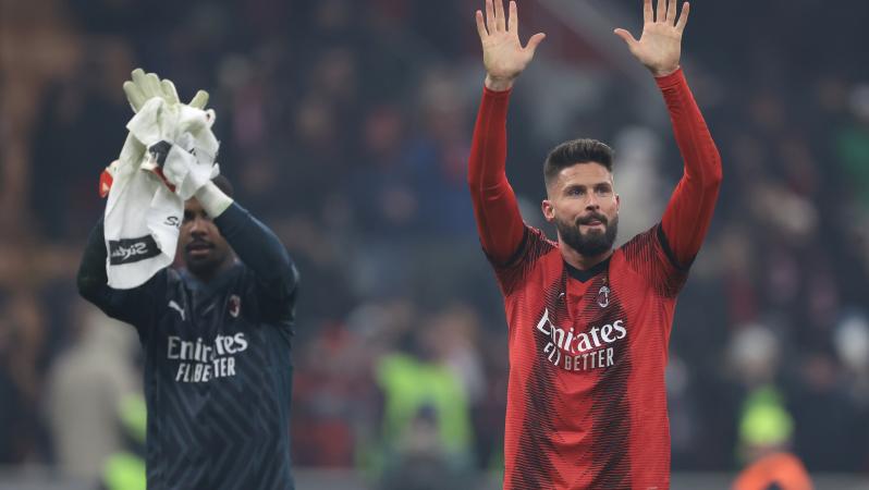 Olivier Giroud salutes fans at San Siro