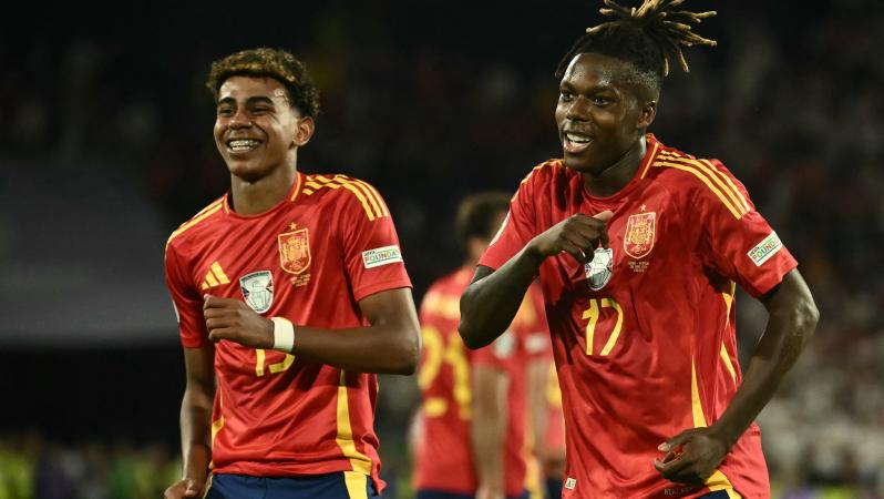 Nico Williams celebrates scoring his team's third goal with his teammates including Spain's forward #19 Lamine Yamal during the UEFA Euro 2024 round of 16 football match between Spain and Georgia