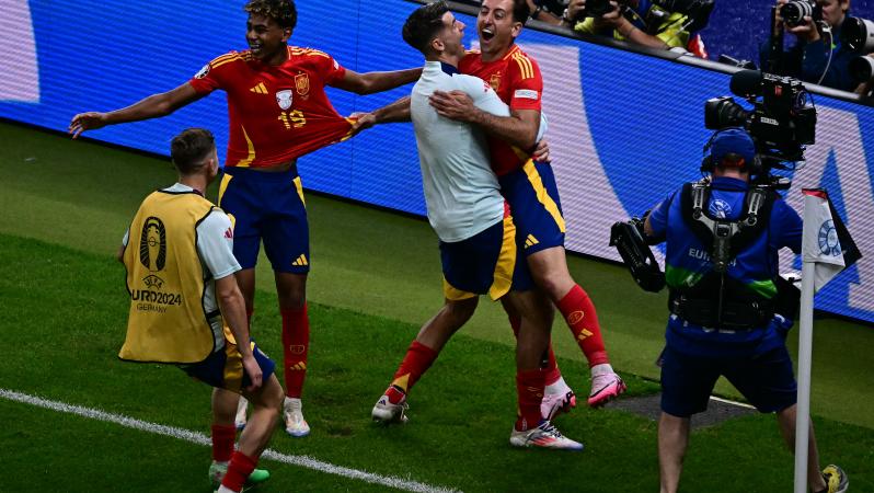 Mikel Oyarzabal celebrates with teammates after scoring their second goal during the UEFA Euro 2024 final football match between Spain and England