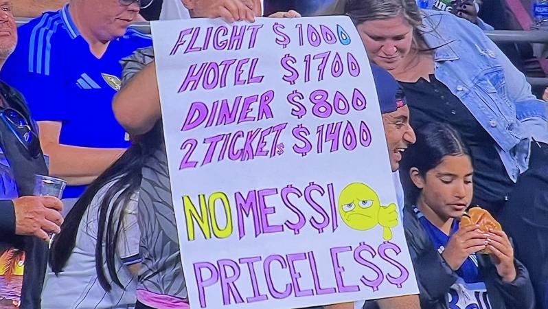 Fan at BC Place in Vancouver showing expenses to watch Lionel Messi