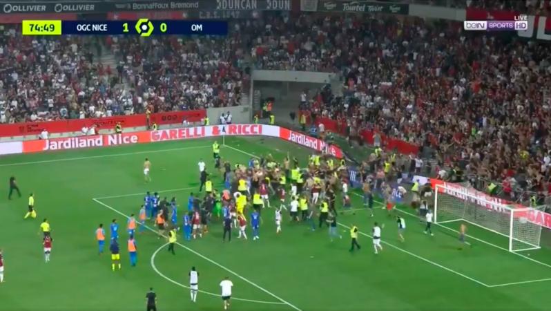 Nice ultras storm pitch vs Marseille