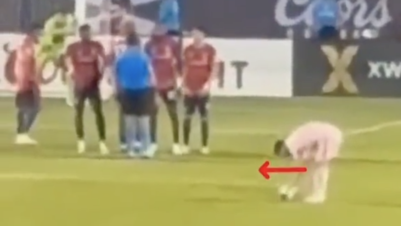 Messi moves ball before free kick