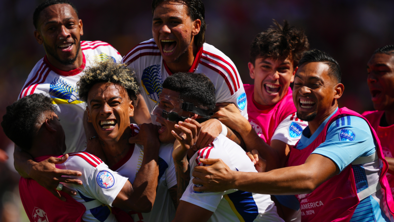 Jhonder Cadiz of Venezuela celebrates with teammates after scoring against Ecuador in 2024 Copa América