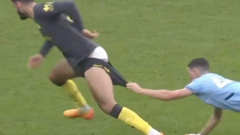 Phil Foden pulling shorts