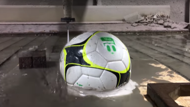 WaterJet Cuts through sports balls 