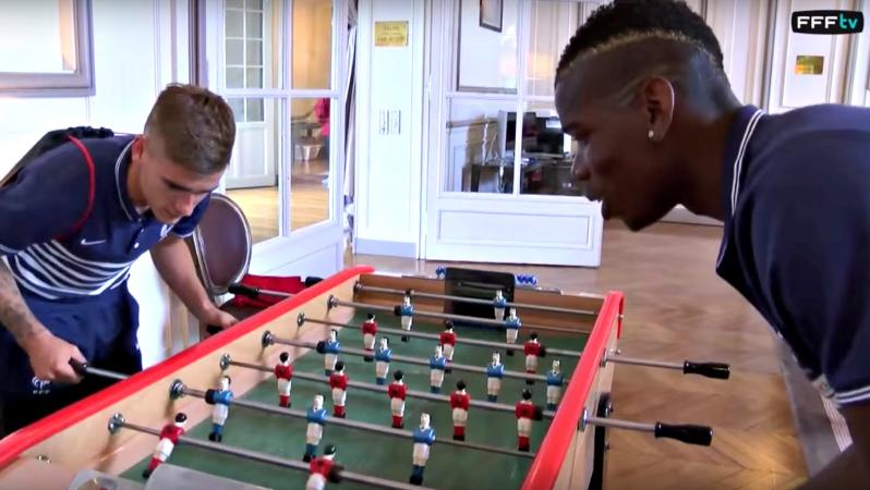 Paul Pogba and Antoine Griezmann play foosball
