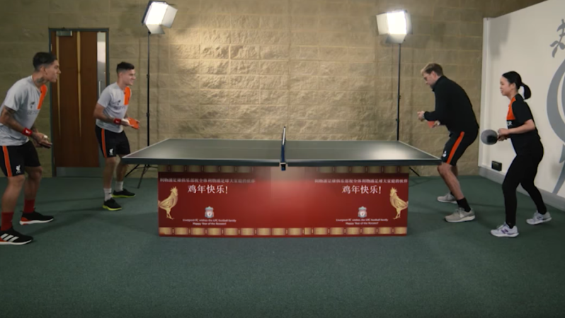 Phil Coutinho and Roberto Firmino take on Jurgen Klopp and Lie Haoyu in ping pong. 