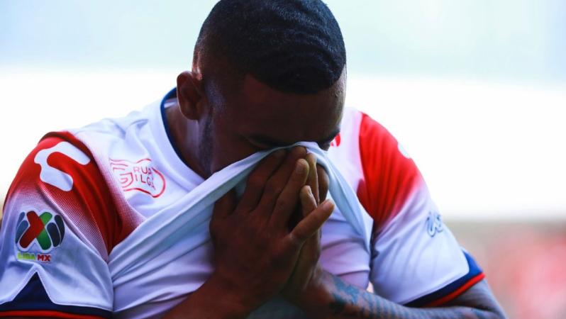 A Veracruz player hangs his head in shame after a brutal loss