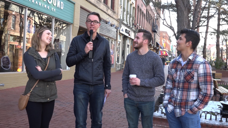 Greg Ellis interviews people on the streets