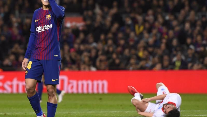 Coutinho laughs at a player writhing in pain