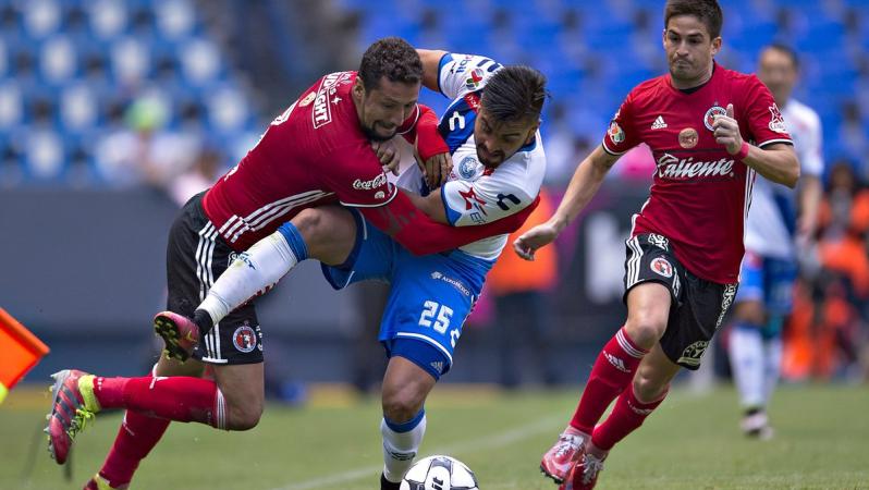 Liga MX players fight it out on the pitch