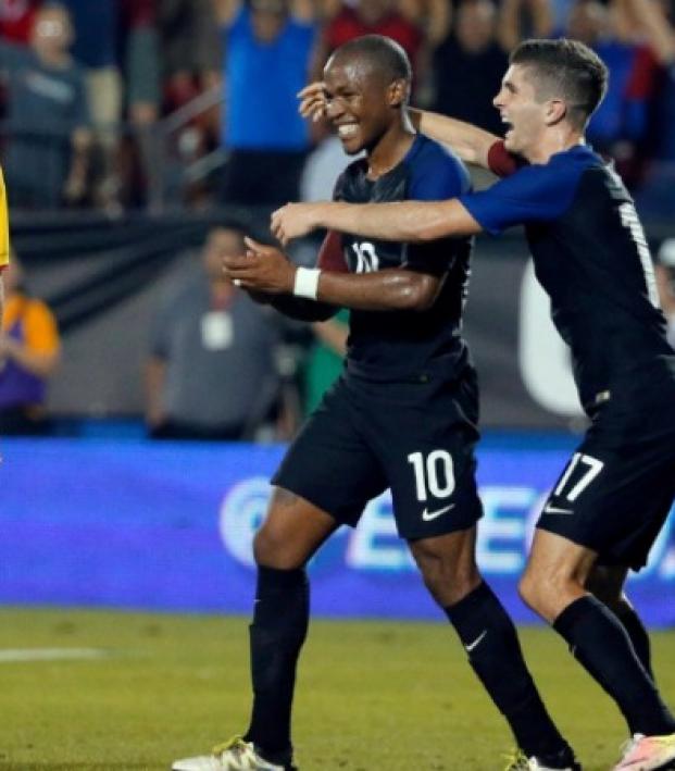 Darlington Nagbe and Christian Pulisic Dagbe and Pulisic celebrate after the Americans finally broke through
