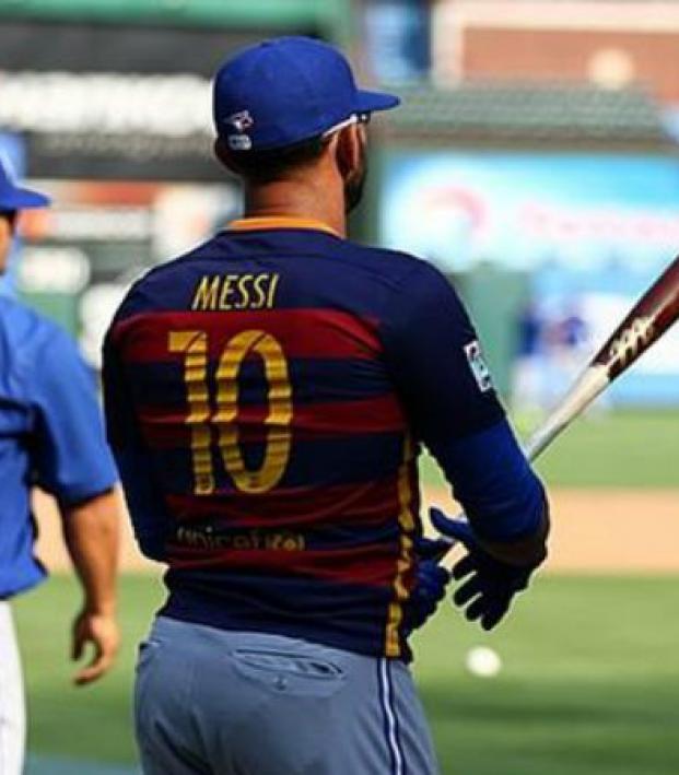 Jose Bautista traded the shirt off his back for a fan's Messi jersey