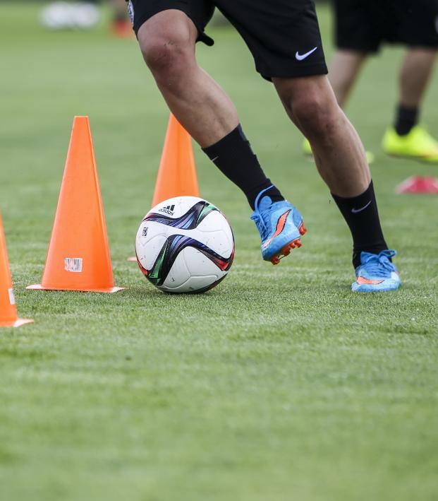 How do soccer players train