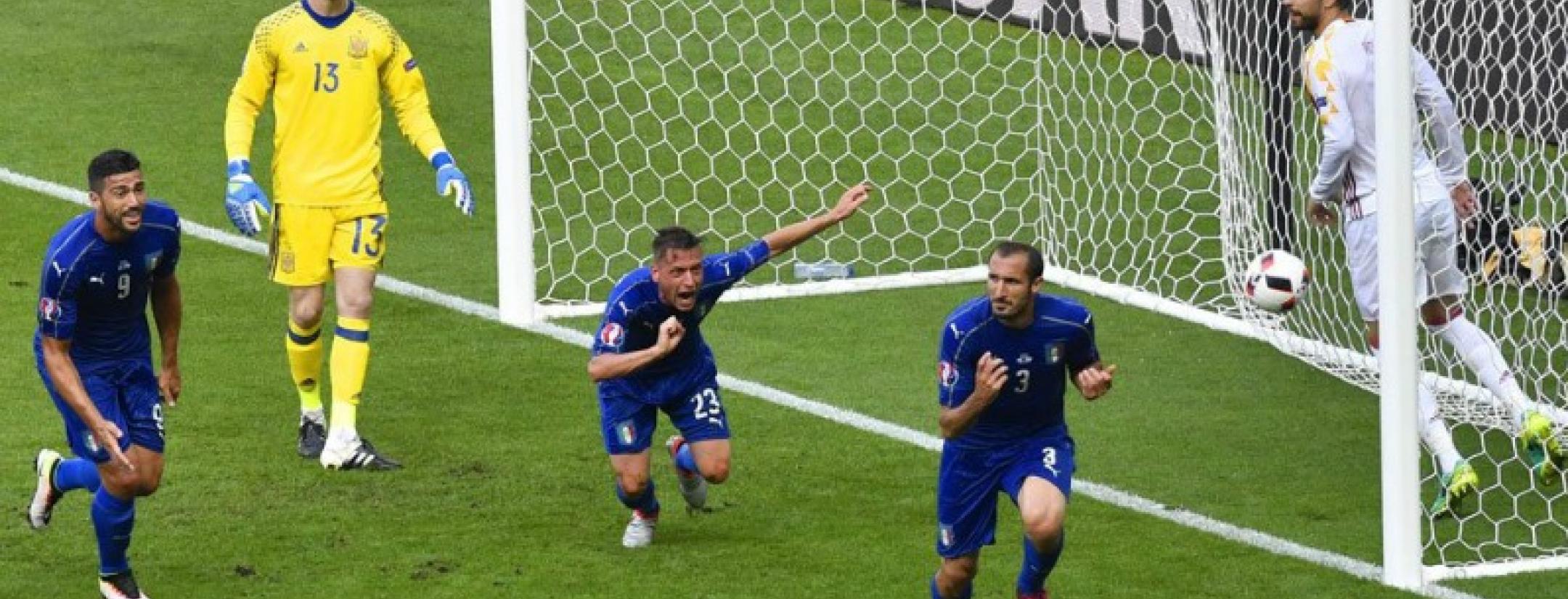 Italy defeats Spain 2-0.