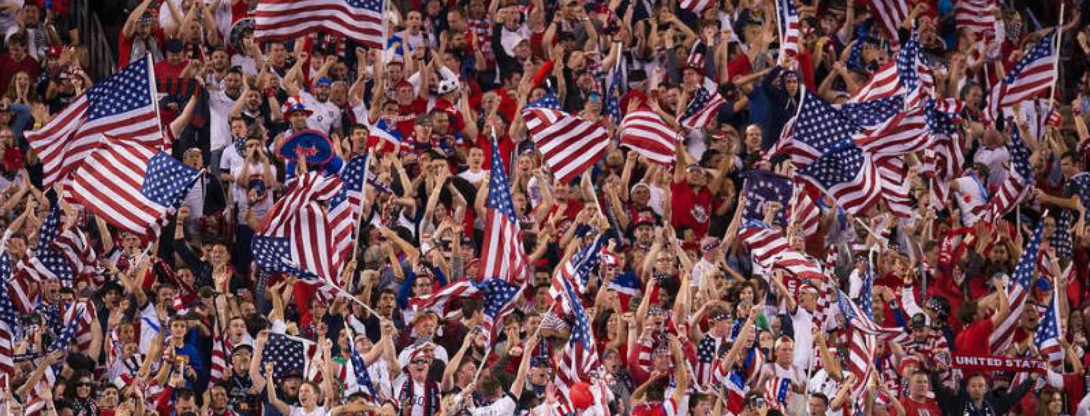 A crowd of United States fans - mostly white - cheers at the 2014 FIFA World Cup in Brazil