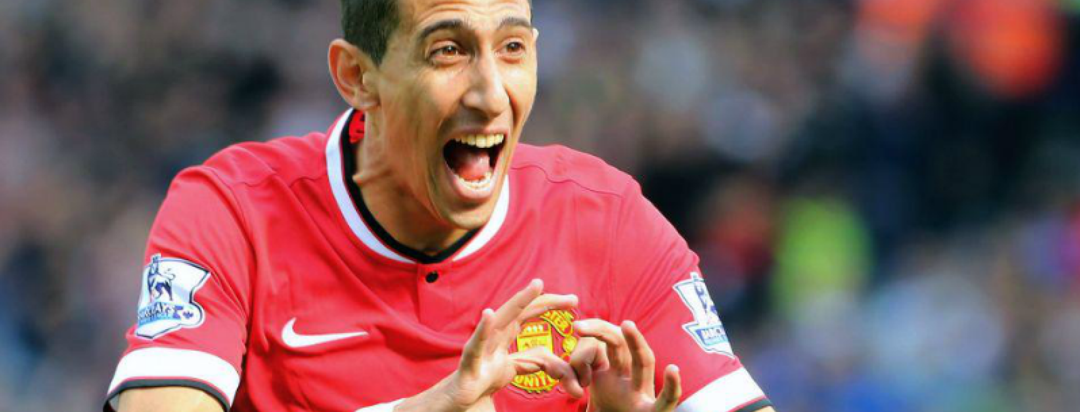 Di maria is pictured performing his trademark heart celebration. 