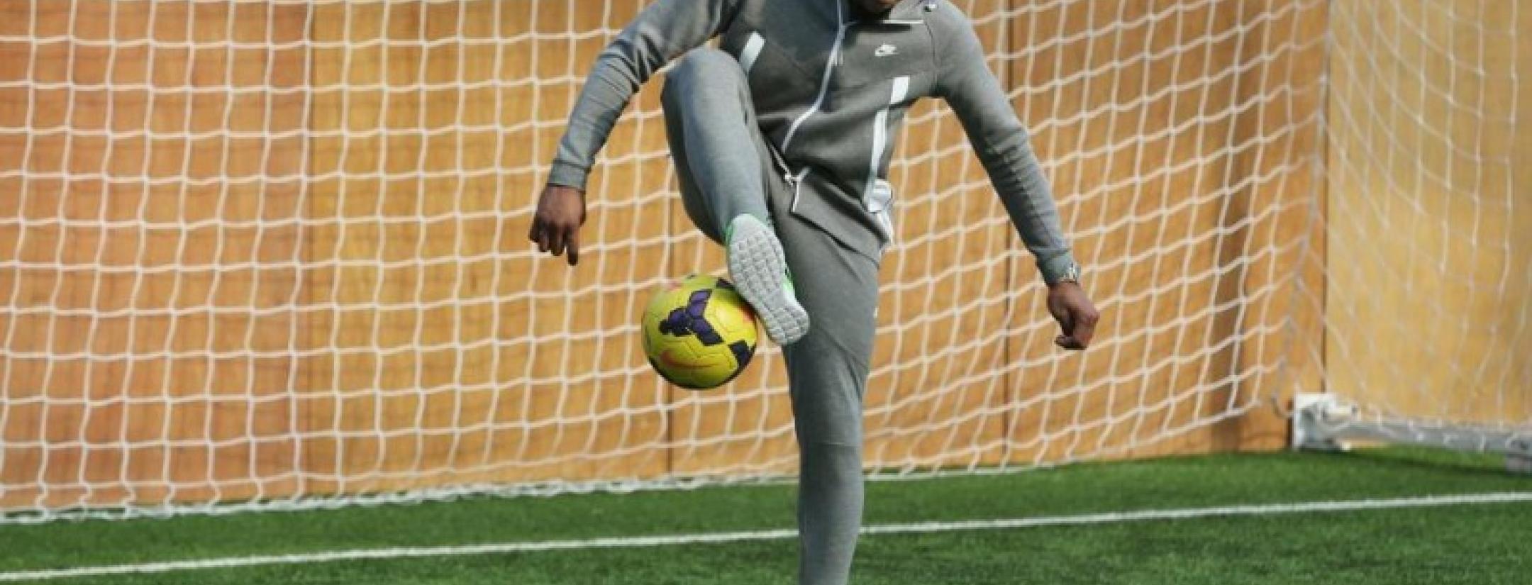 Odell Beckahm Jr juggles soccer ball