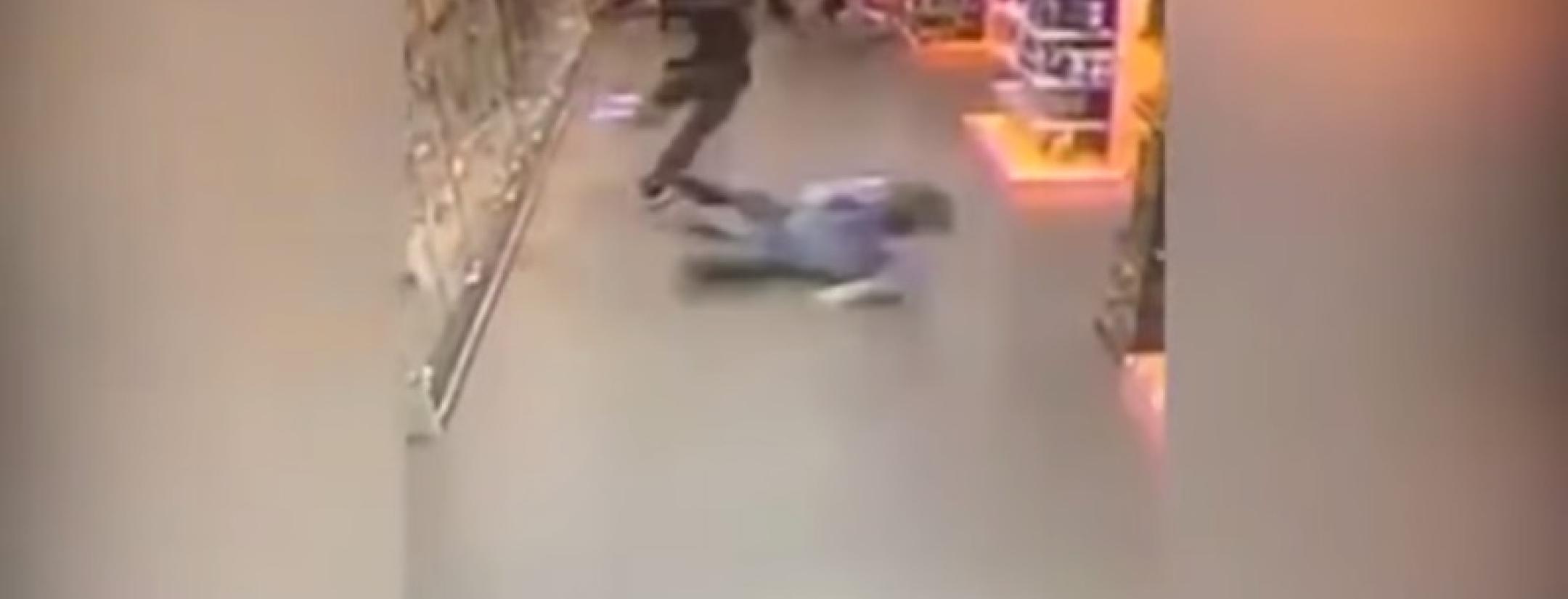 kid getting slide tackled