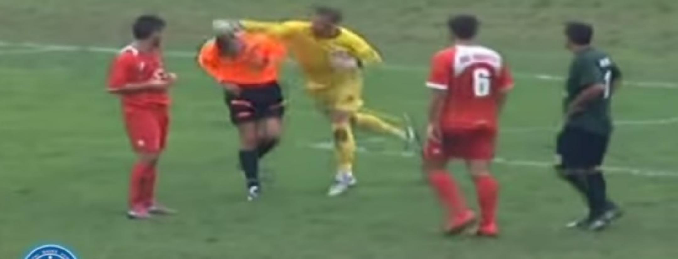 Goalkeeper punches referee