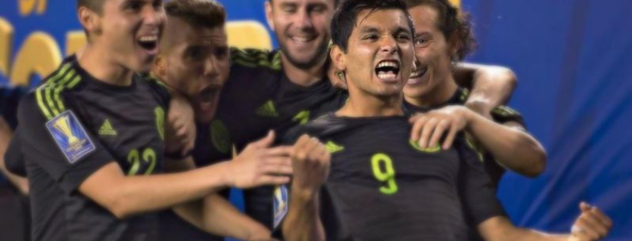 Corona surrounded in celebration by his Mexico teammates. 