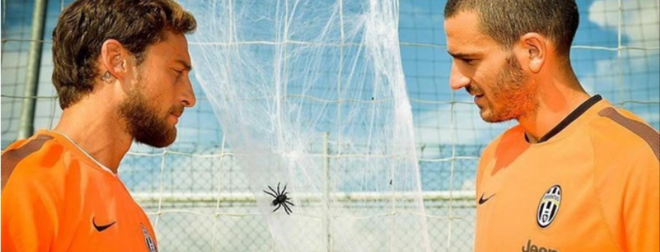 Leonardo Bonucci and Claudio Marchisio with spiders in net