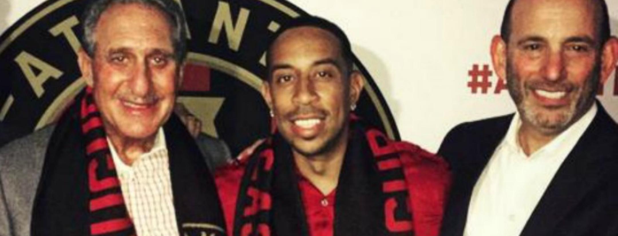 Ludacris with an Atlanta United scarf.