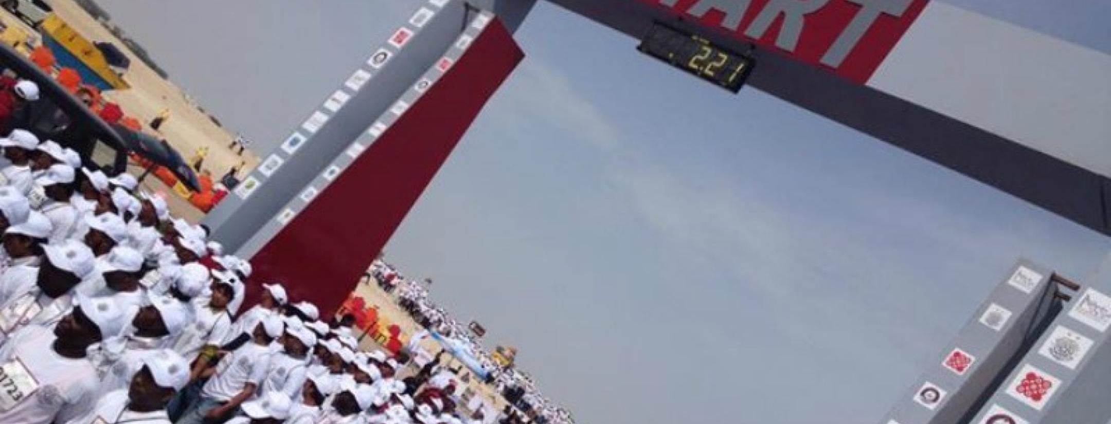 Qatar Workers Line Up To Run A Shoeless Marathon