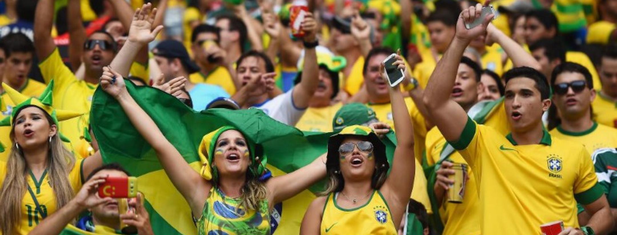 A sea of Brazilian fans in yellow cheer on their national team