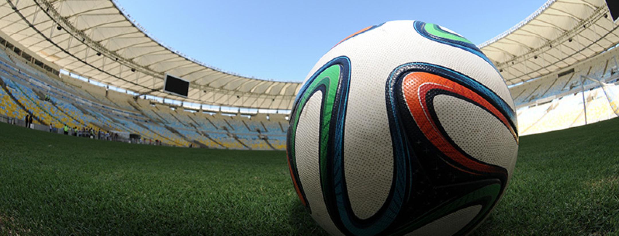 Brazuca soccer ball on field